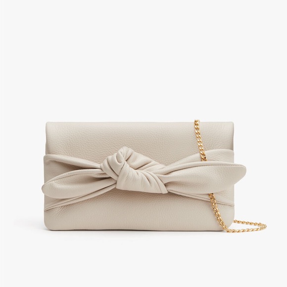 Cuyana Handbags - NEW Cuyana Bow Clutch in Ecru Pebbled Leather